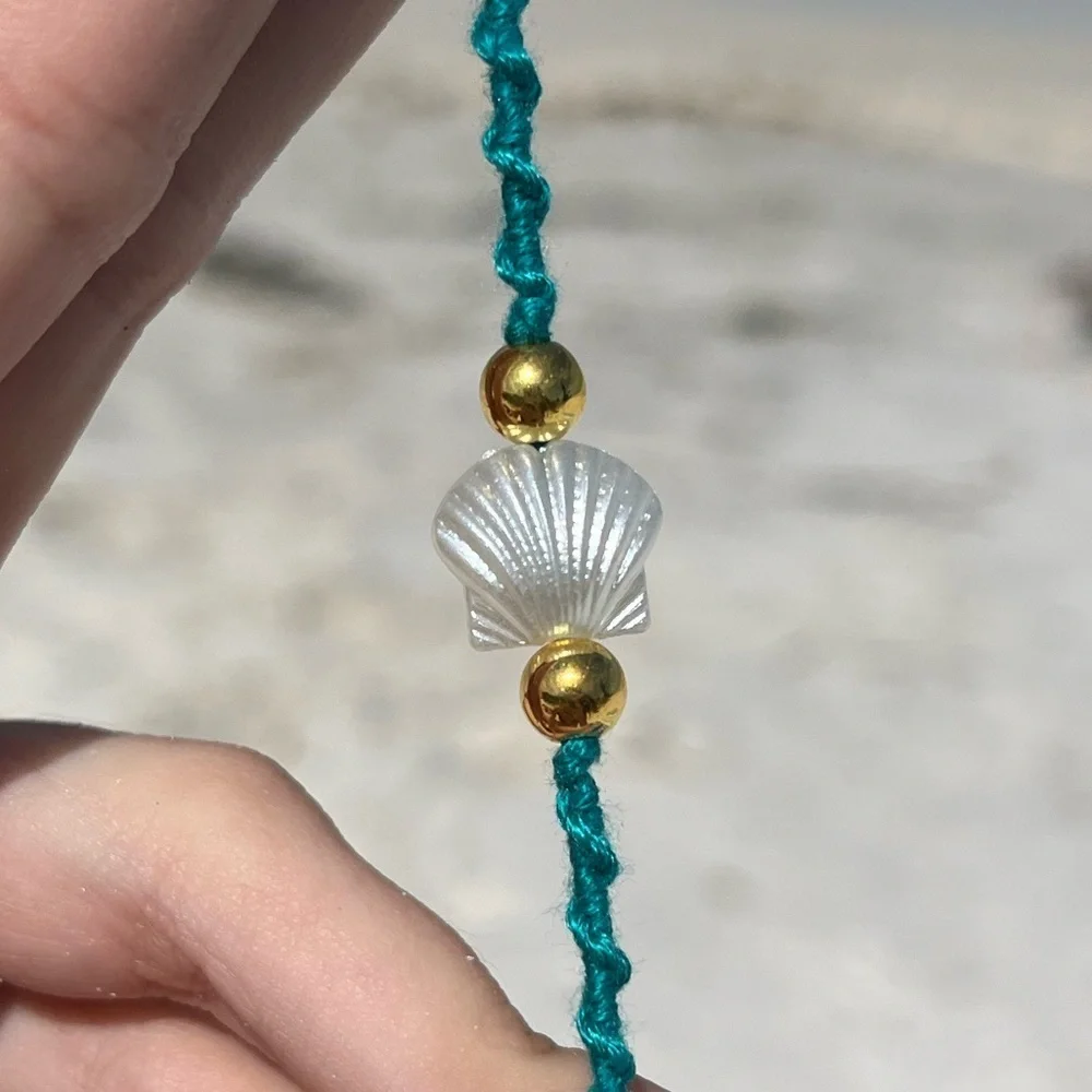Handmade woven teal pearl shell gold bead bracelet